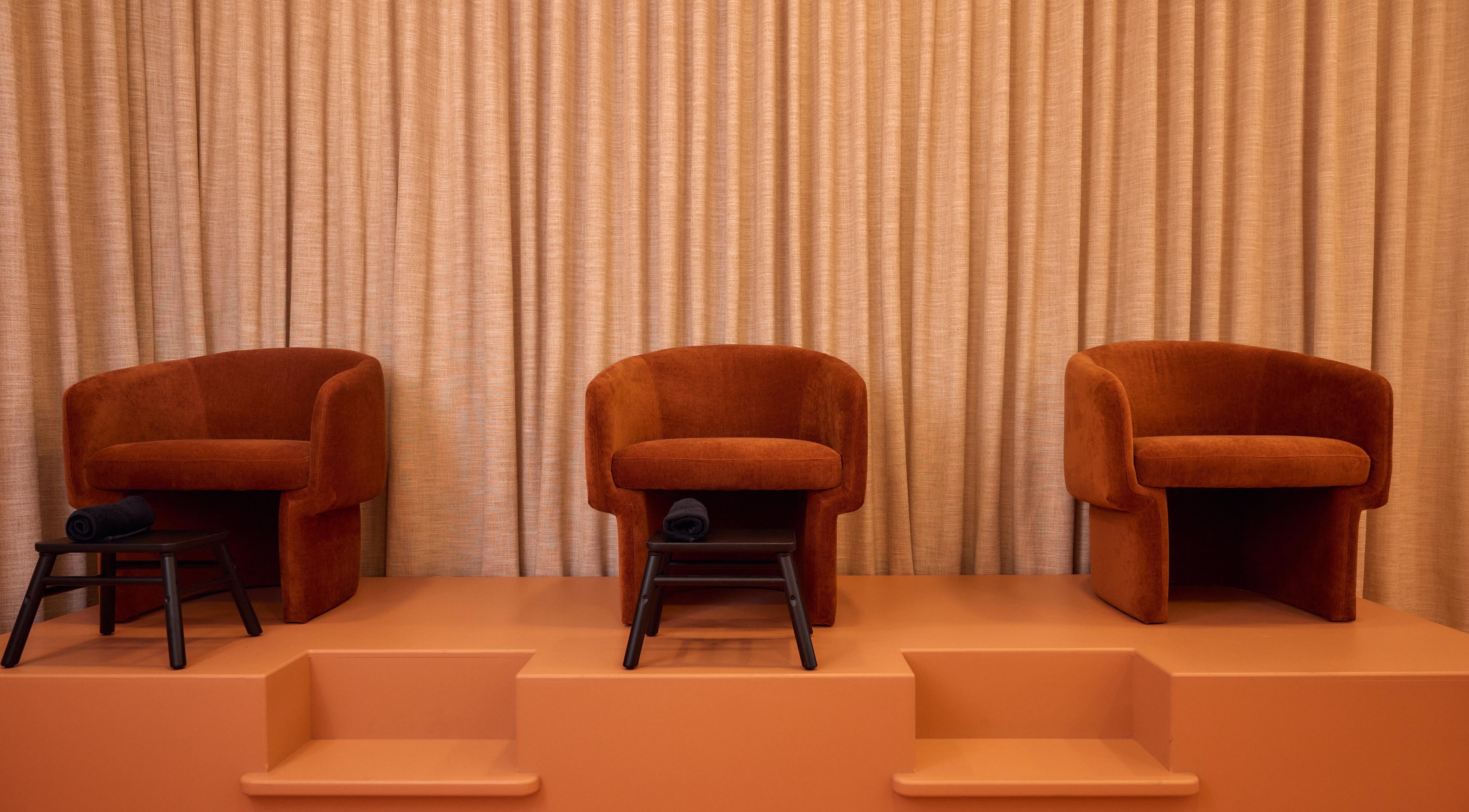 Elegant rust chairs at Painted, Darlinghurst, New South Wales, AU, offering a cozy and inviting ambience.