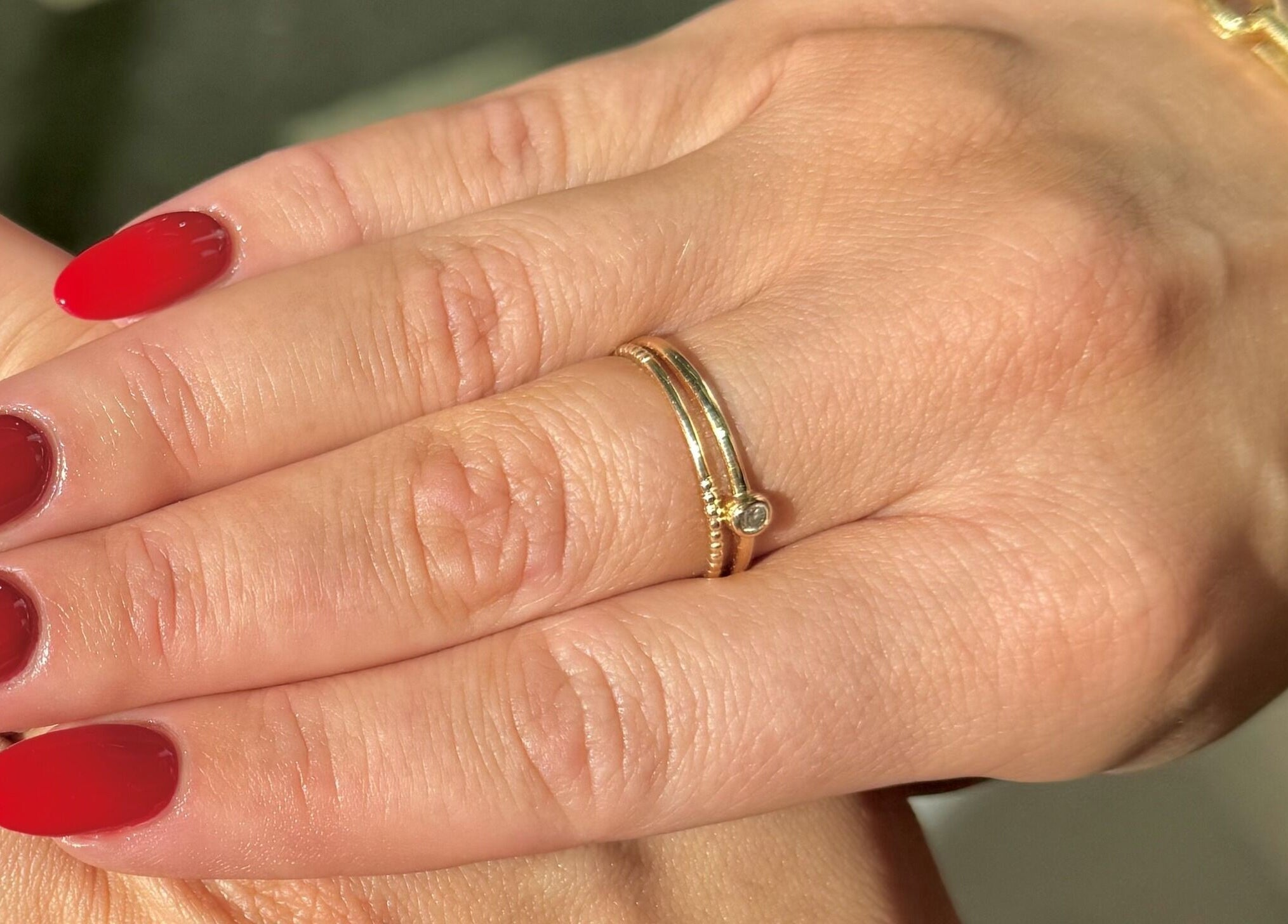 Vibrant red manicured nails showcased at Painted, Darlinghurst, New South Wales, AU.