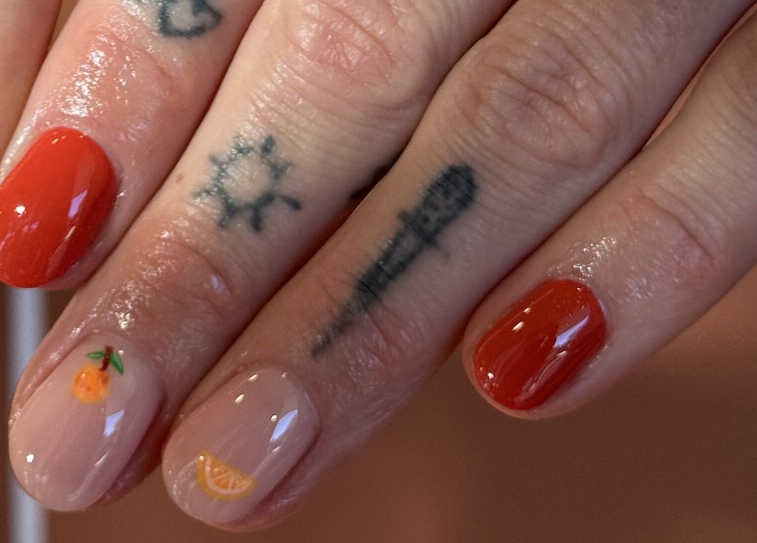 Bright orange and citrus nail art at Painted, Darlinghurst, New South Wales, AU.