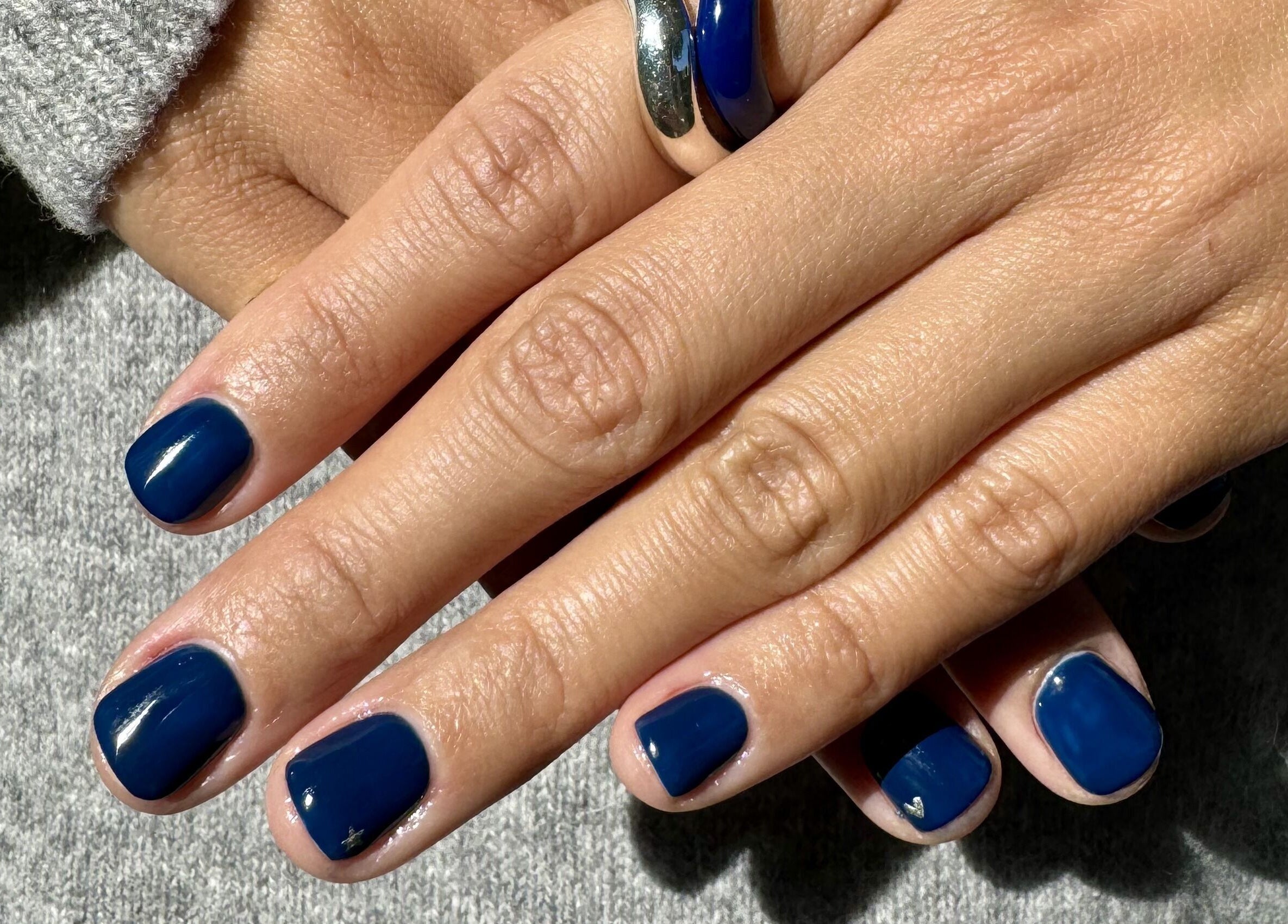 Elegant navy manicure at Painted in Darlinghurst, New South Wales, AU. Perfectly polished nails.
