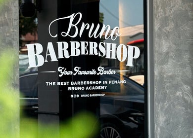 Entrance of Bruno Barbershop (1st Outlet) in George Town, Pulau Pinang, MY with stylish signage.