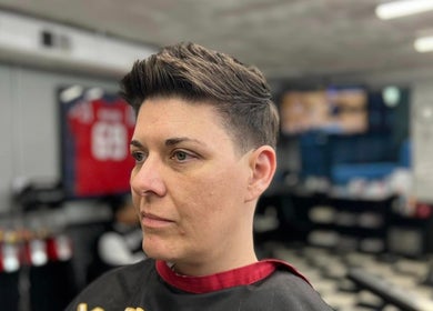 Stylish haircut at Sacred Diamond Grooming and Wellness, Columbia, Tennessee, US. Modern barbering excellence.