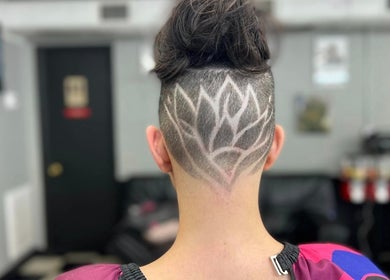 Intricate lotus hair design showcased at Sacred Diamond Grooming and Wellness, Columbia, Tennessee, US.