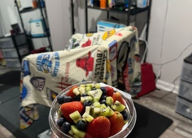 Colorful fruit bowl on stylish chair at Columbia | Sacred Diamond Groom + Well, Columbia, Tennessee, US.