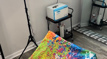 Vibrant splatter sheet at Sacred Diamond Groom + Well in Columbia, Tennessee, US.