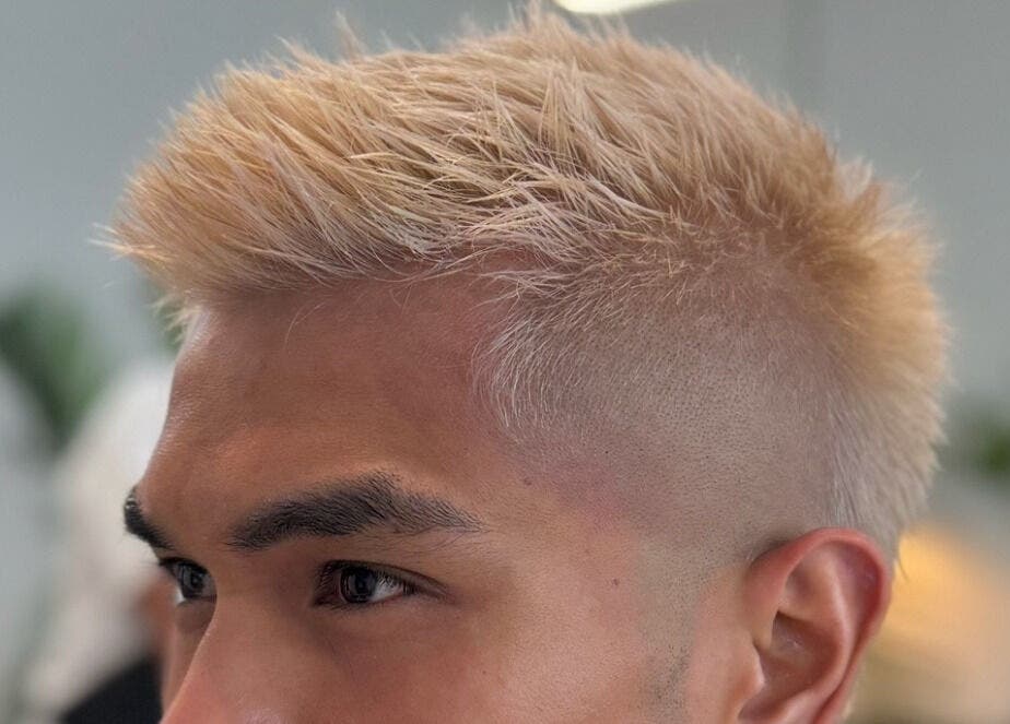 Modern blonde buzz cut at Admir the Barber in Melbourne, Victoria, AU, showcasing expert haircutting skills.