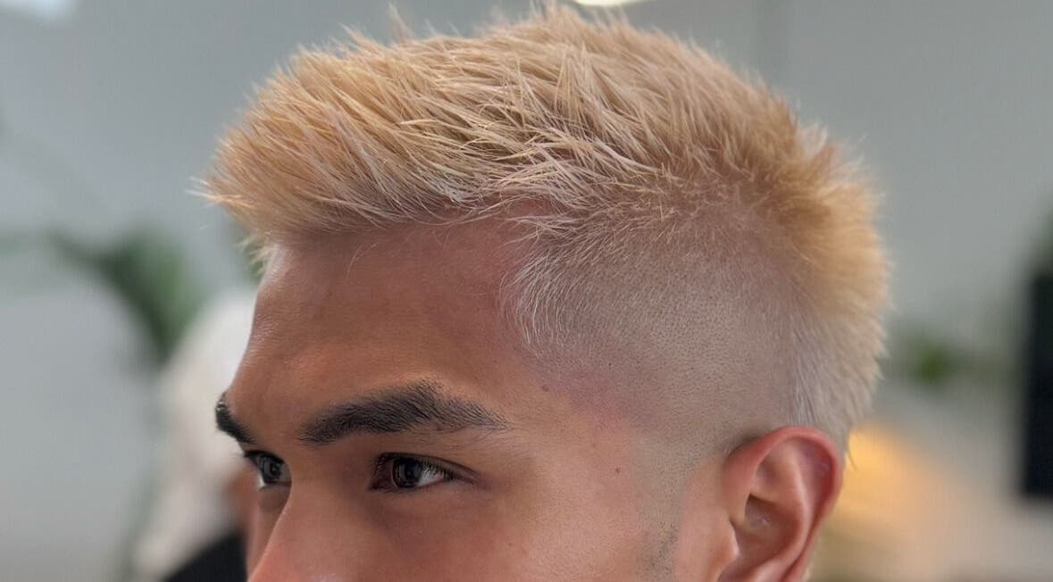 Modern blonde buzz cut at Admir the Barber in Melbourne, Victoria, AU, showcasing expert haircutting skills.