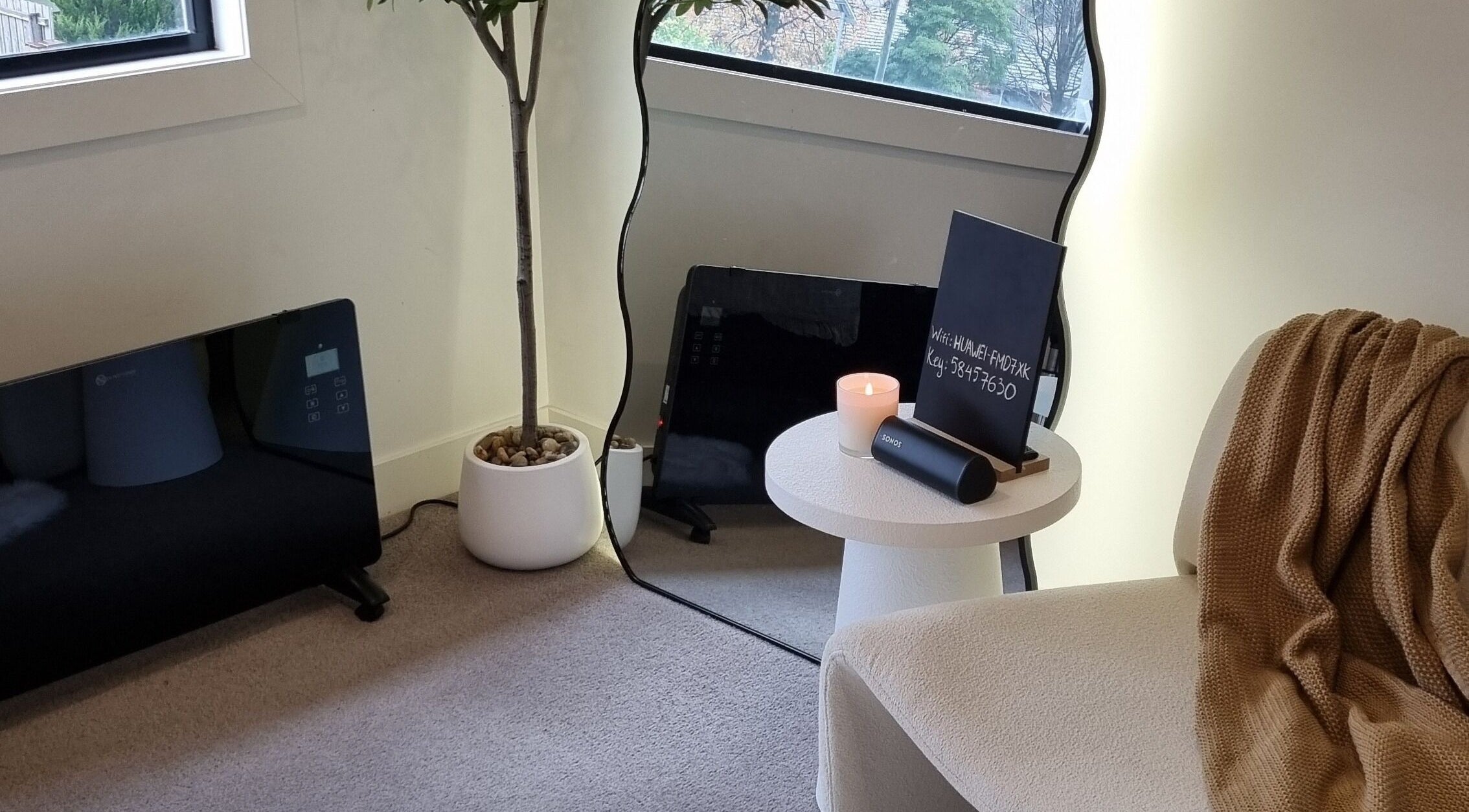 Relaxing corner at Sleeping Beauty by Phoebe, Chadstone, Victoria, AU with cozy seating and decor.