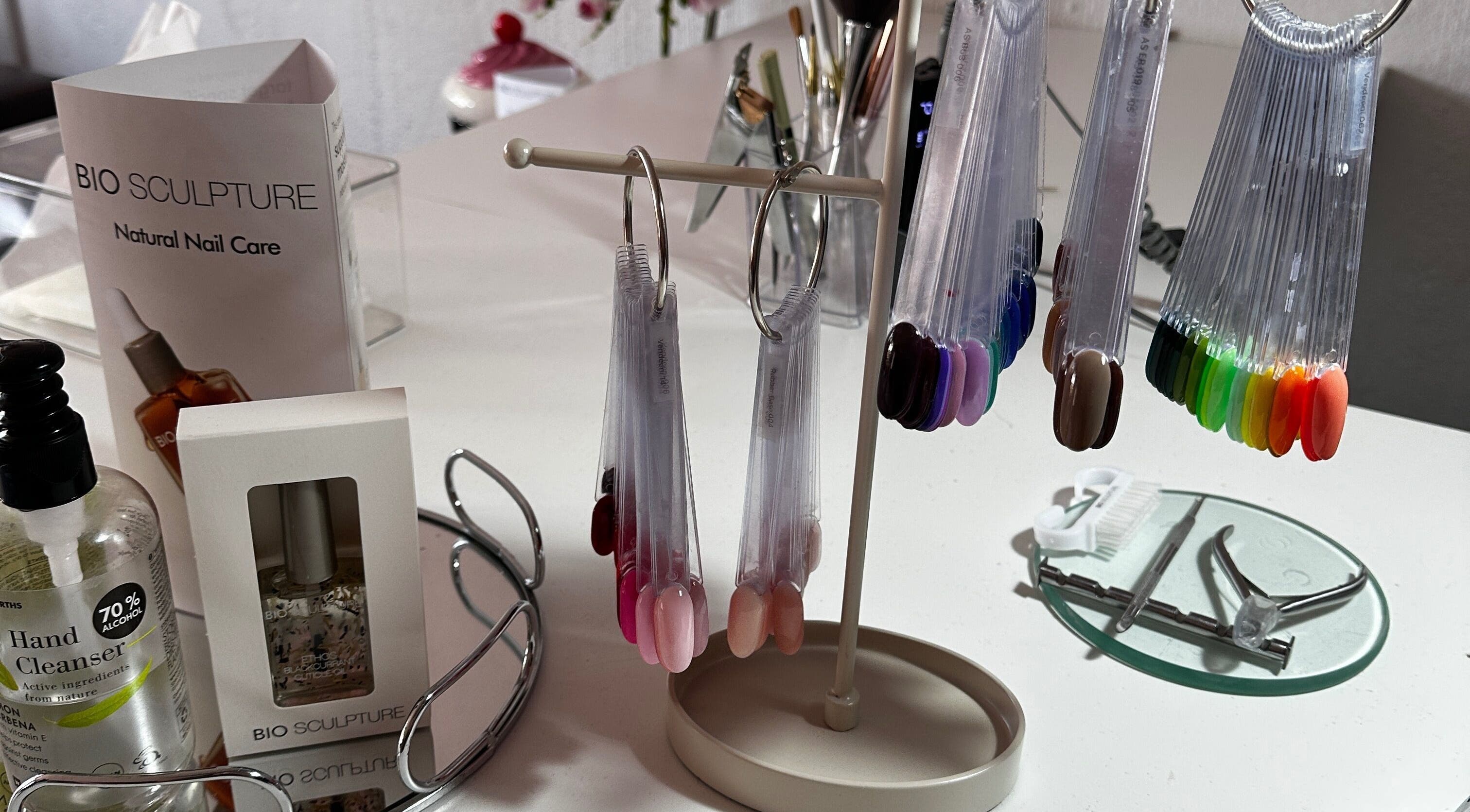 Nail polish samples and tools at Sets by Zay, Roodepoort, Gauteng, ZA, showcasing vibrant beauty options.