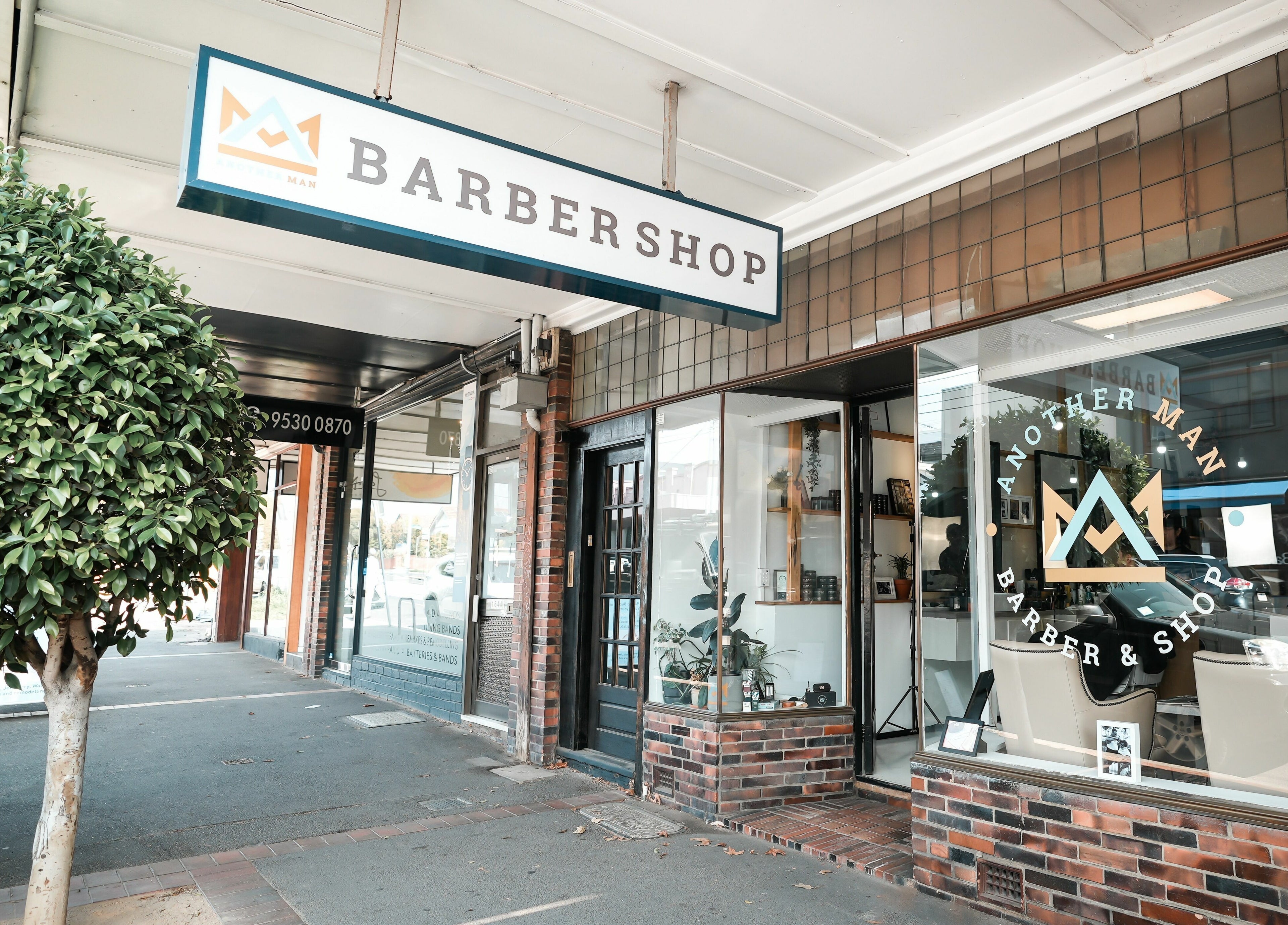 Front view of Caulfield North - Another Man Barber and Shop in Melbourne, Victoria, AU, showcasing classy exterior.