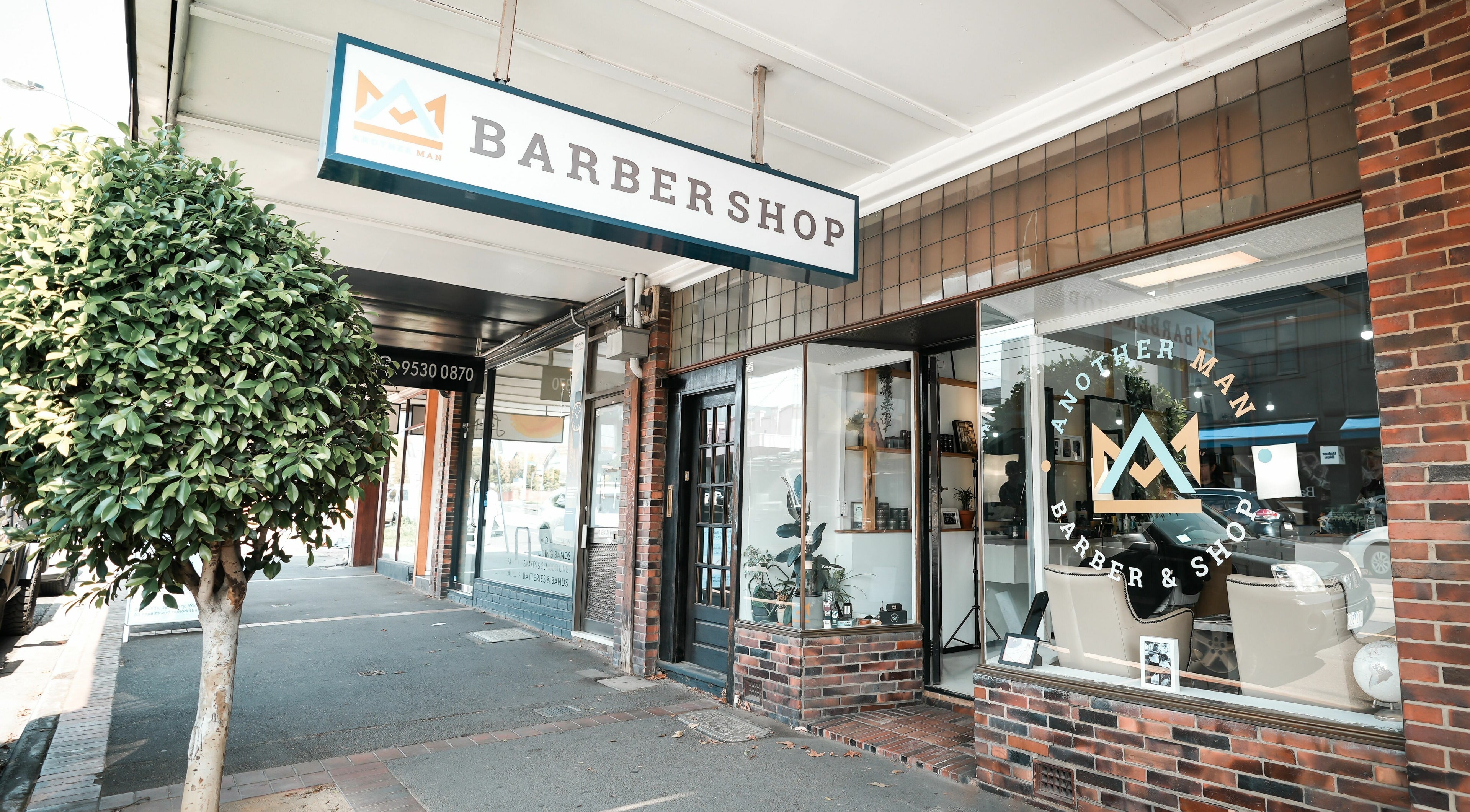 Front view of Caulfield North - Another Man Barber and Shop in Melbourne, Victoria, AU, showcasing classy exterior.