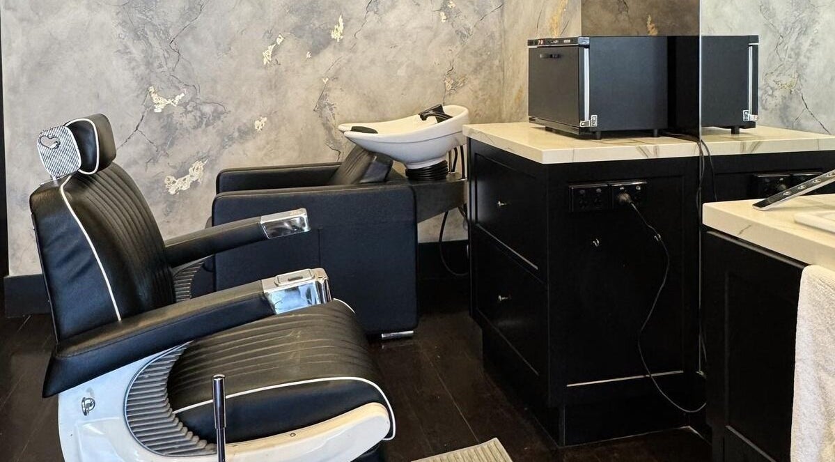 Stylish barber chair and sink at Kew - Another Man Barber & Shop in Melbourne, Victoria, AU.