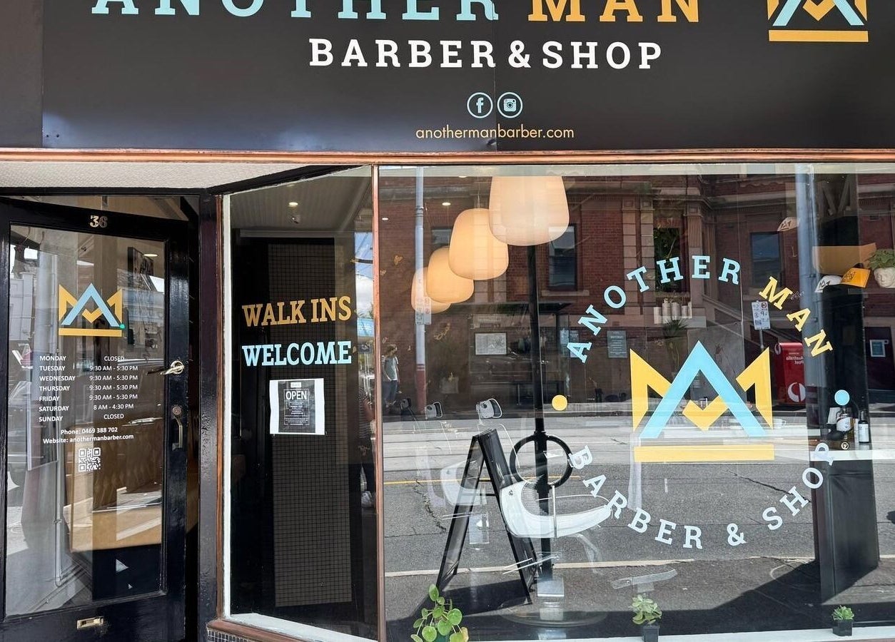 Front of Kew - Another Man Barber & Shop in Melbourne, Victoria, AU, showcasing welcoming entrance and signage.