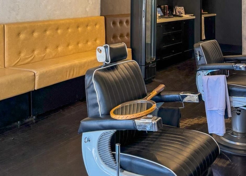 Elegant interior of Kew - Another Man Barber & Shop in Melbourne, Victoria, AU featuring stylish barber chairs.