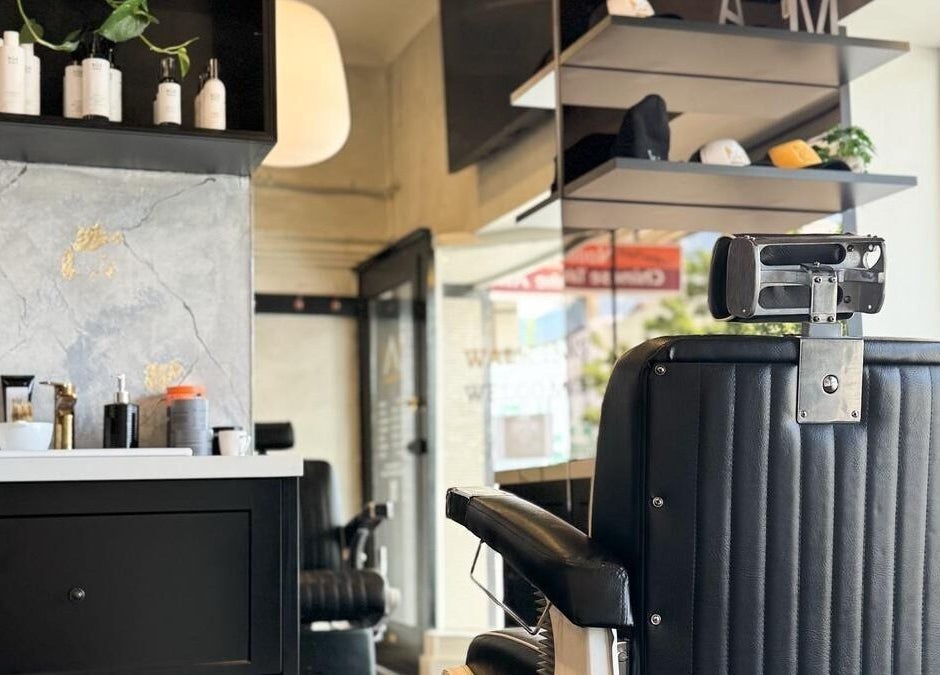 Stylish barber chair at Kew - Another Man Barber & Shop, Melbourne, Victoria, AU with modern decor.