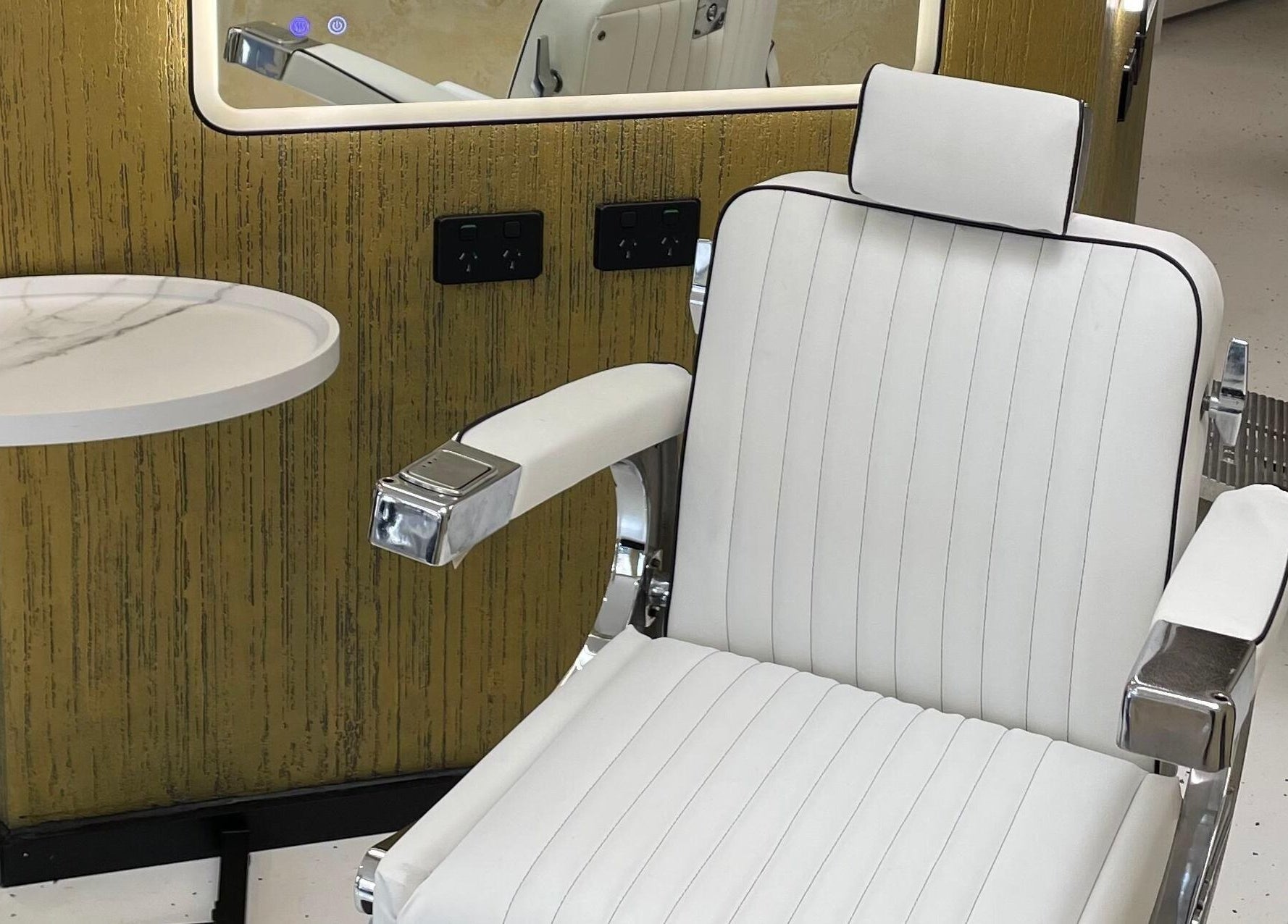 Stylish barber chair at Ripponlea - Another Man Barber & Shop, Melbourne, Victoria, AU, offering premium grooming.