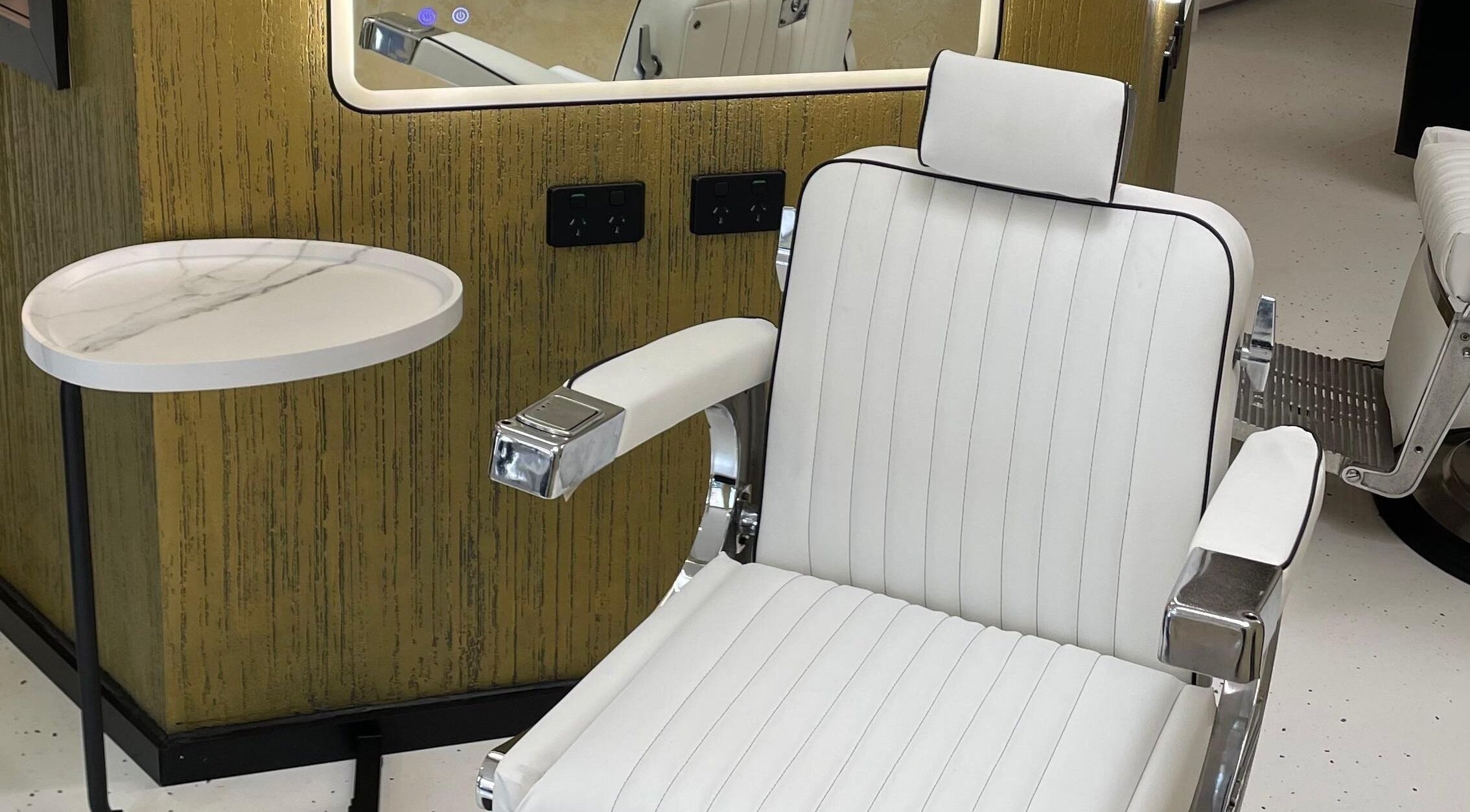 Stylish barber chair at Ripponlea - Another Man Barber & Shop, Melbourne, Victoria, AU, offering premium grooming.