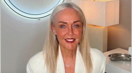 Smiling individual at Carrie Styles Clinic, Crawley, England, GB with elegant ambiance.