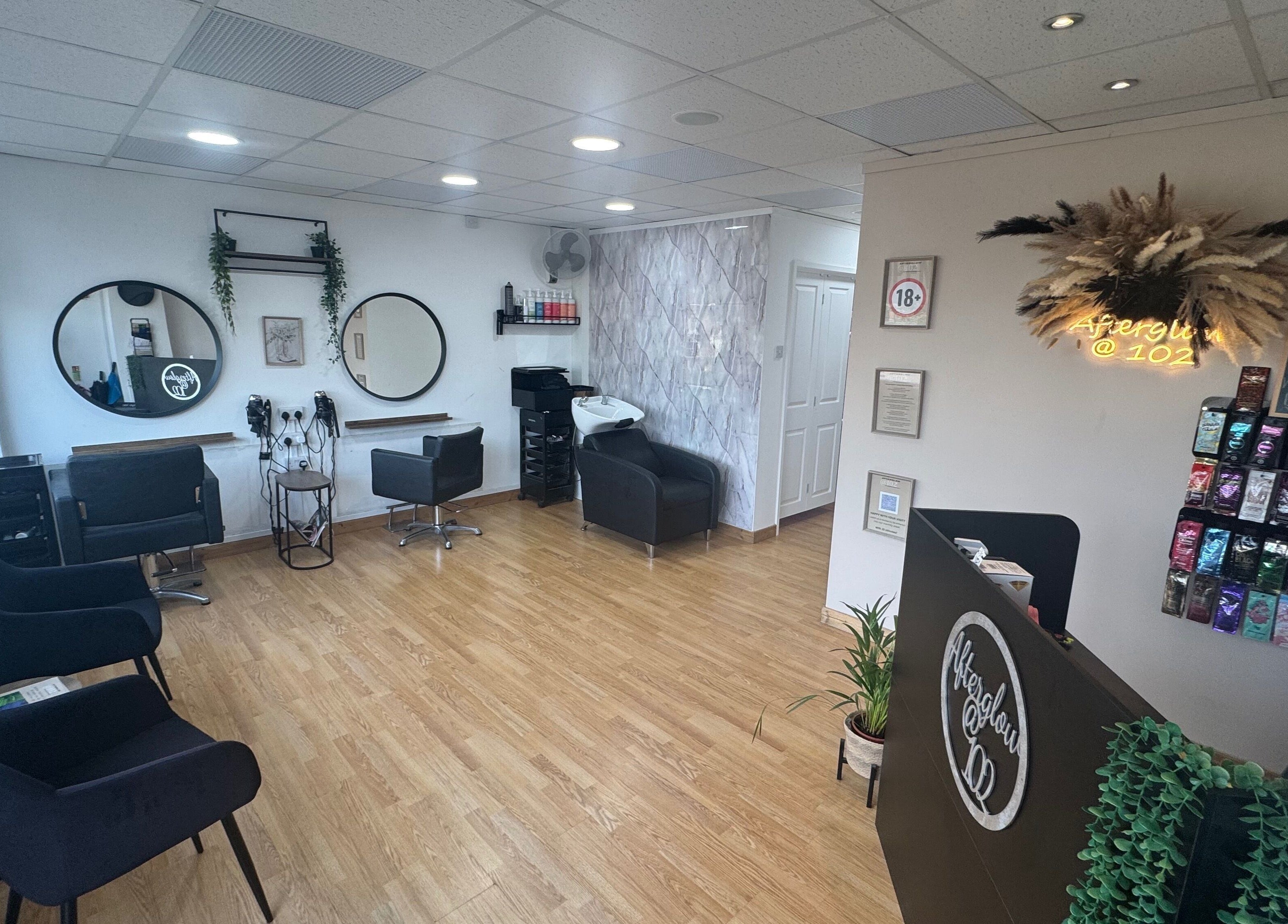 Modern interior of Afterglow at 102 in Fareham, England, GB with stylish seating and decor.