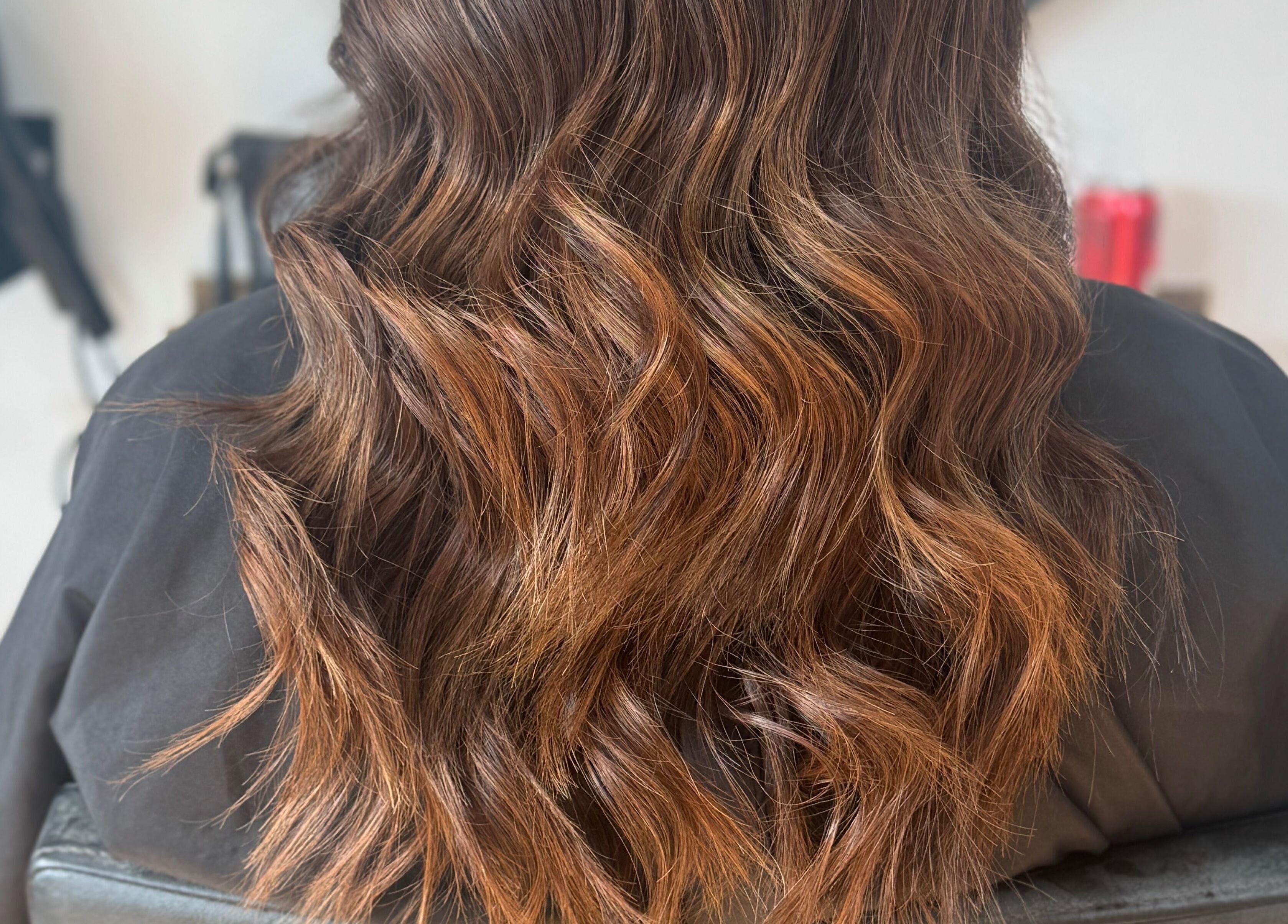 Stylish wavy hair treated at Afterglow at 102, Fareham, England, GB. Perfect for modern hairstyles.