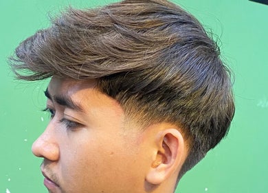Close-up of a stylish fade haircut at THE CUTZS, Machang, Kelantan, MY barbershop.