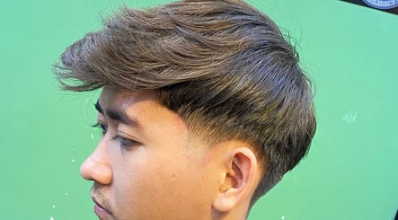 Close-up of a stylish fade haircut at THE CUTZS, Machang, Kelantan, MY barbershop.