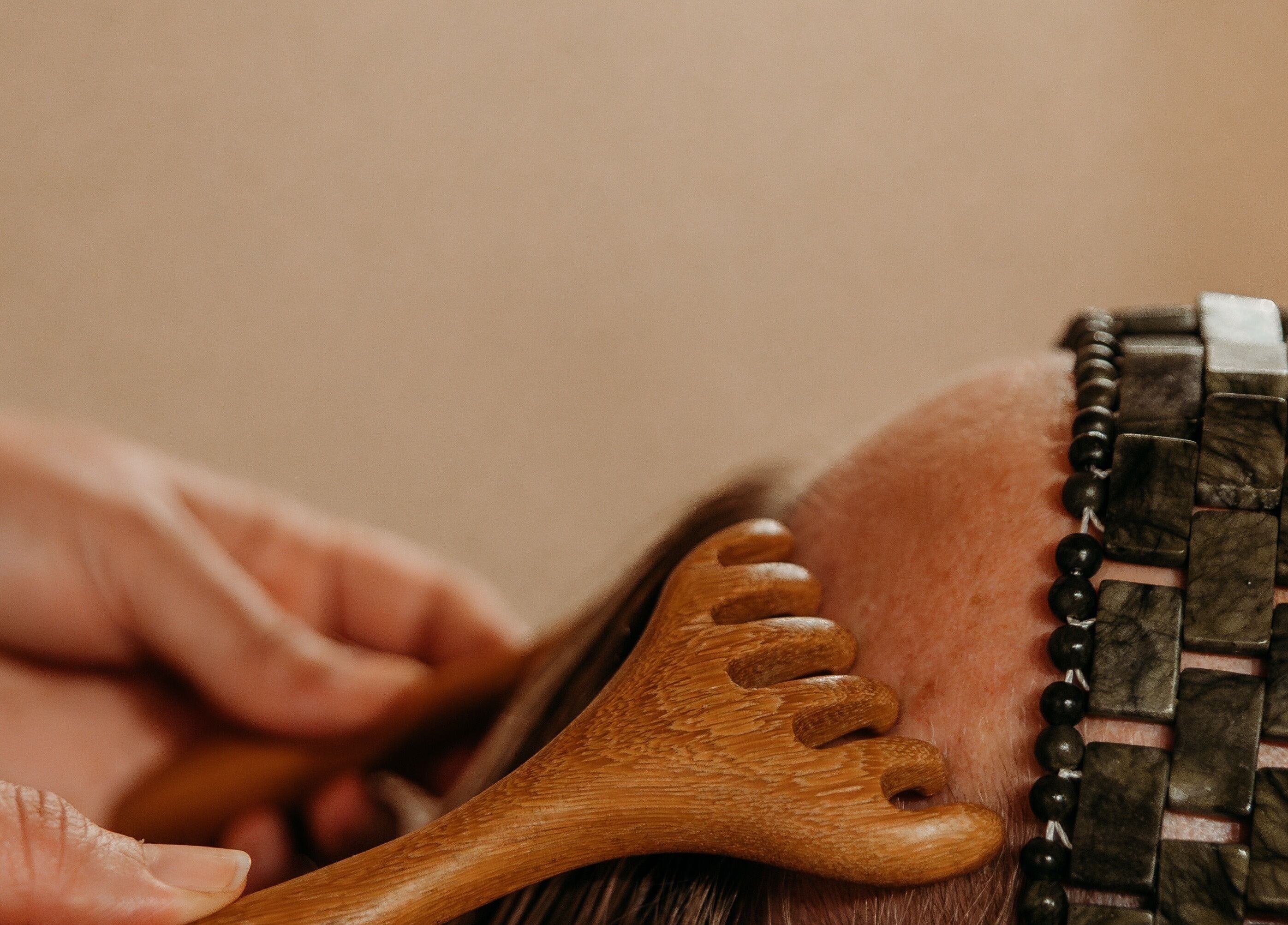 Relaxing wooden massage at Hansen Botanics, Shrewsbury, England, GB. Enhance wellness naturally.