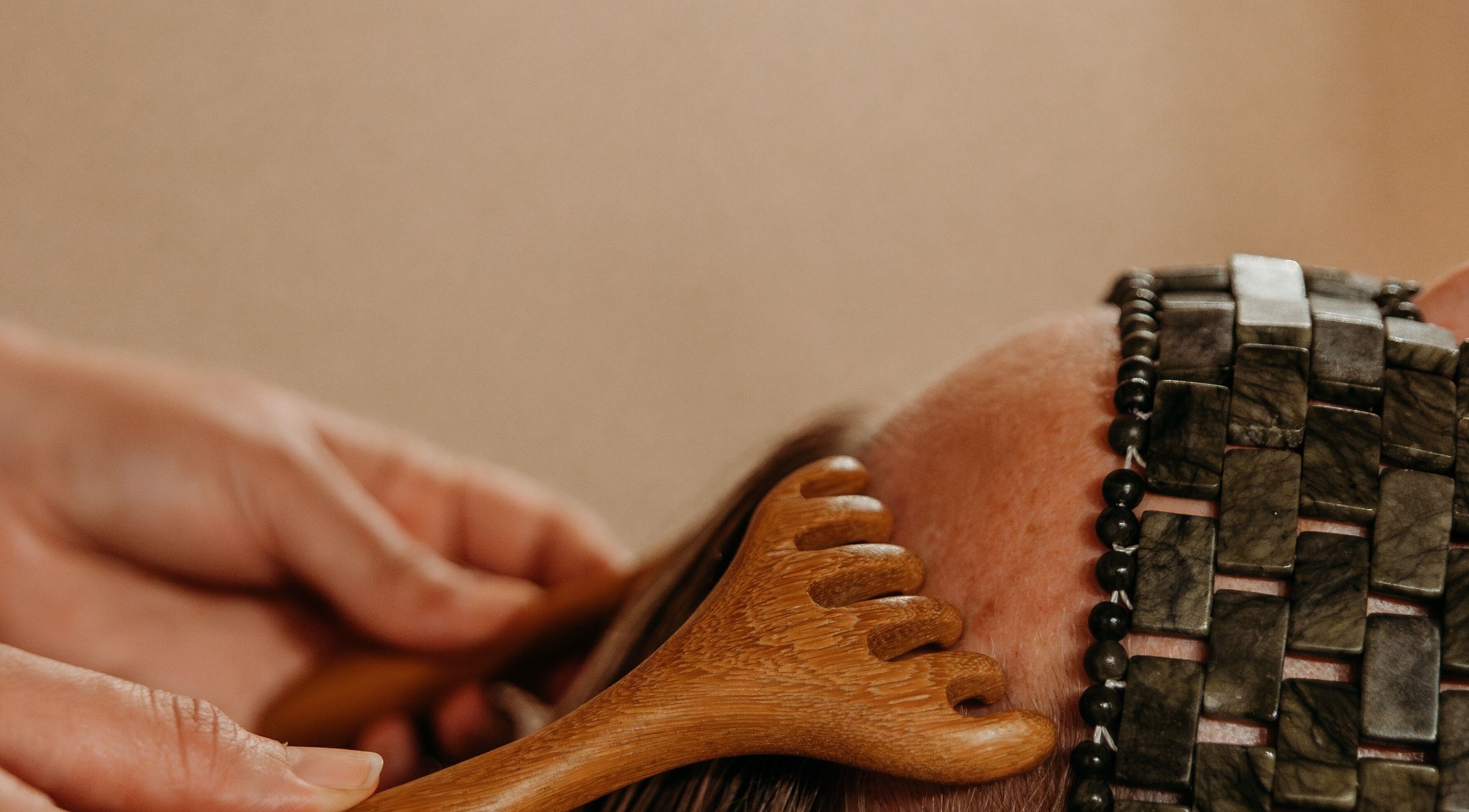 Relaxing wooden massage at Hansen Botanics, Shrewsbury, England, GB. Enhance wellness naturally.
