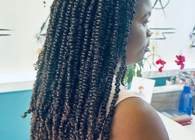 Stylish hair twists at Nubian Crown Hyde Park, Sandton, Gauteng, ZA. Perfect blend of style and care.