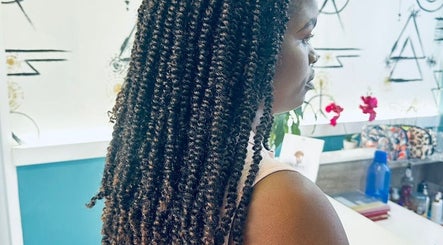 Stylish hair twists at Nubian Crown Hyde Park, Sandton, Gauteng, ZA. Perfect blend of style and care.