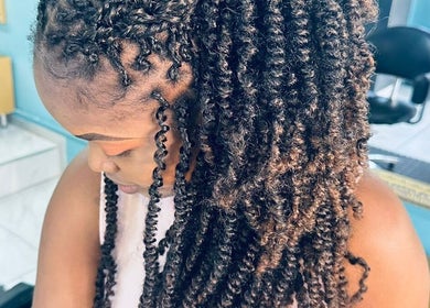 Beautifully styled twist hairstyle at Nubian Crown Hyde Park, Sandton, Gauteng, ZA salon.