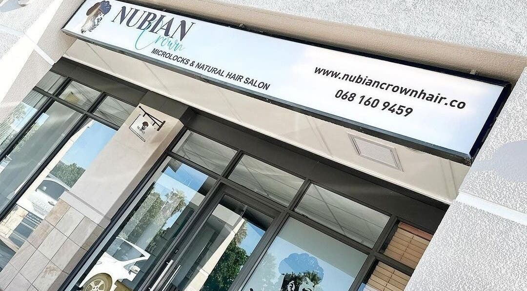 Entrance of Nubian Crown Parklands salon in Cape Town, Western Cape, ZA, showcasing modern design.