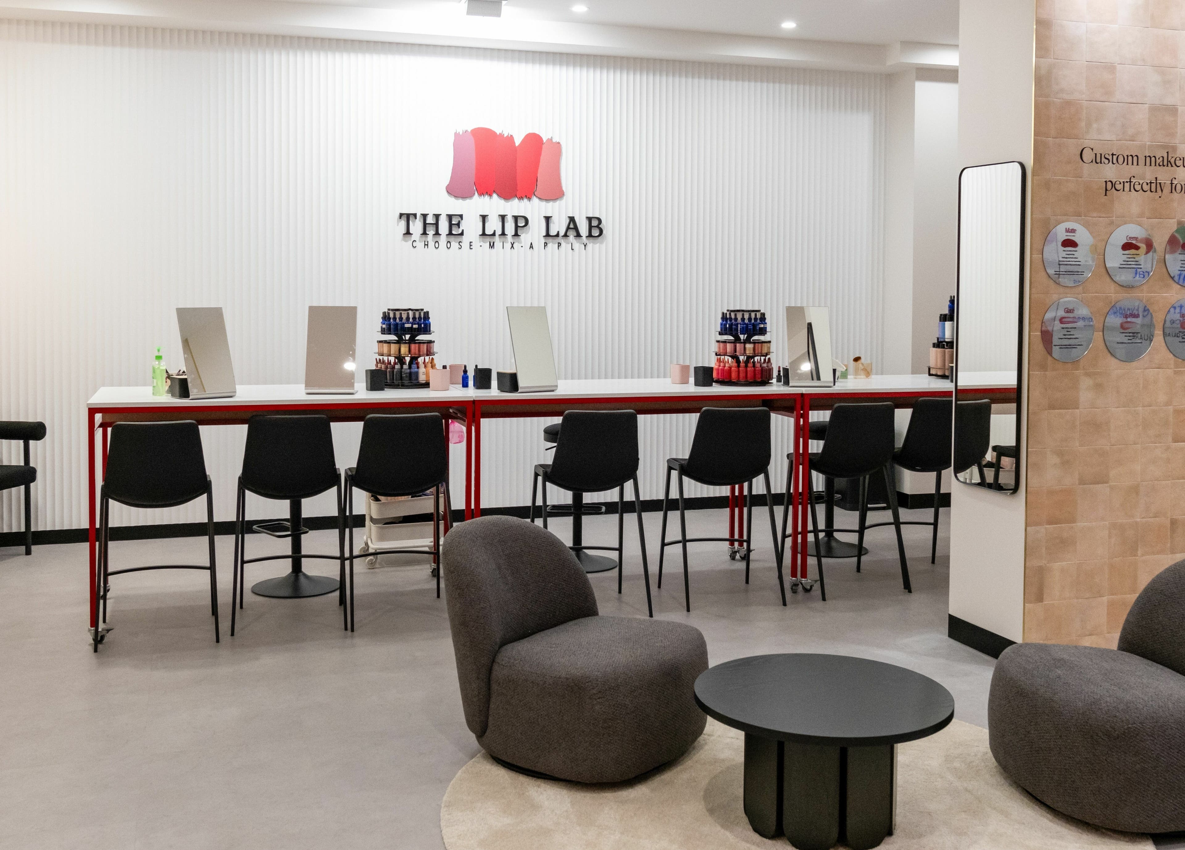 Stylish interior of The Lip Lab in Perth, Western Australia, AU with makeup stations and plush seating.