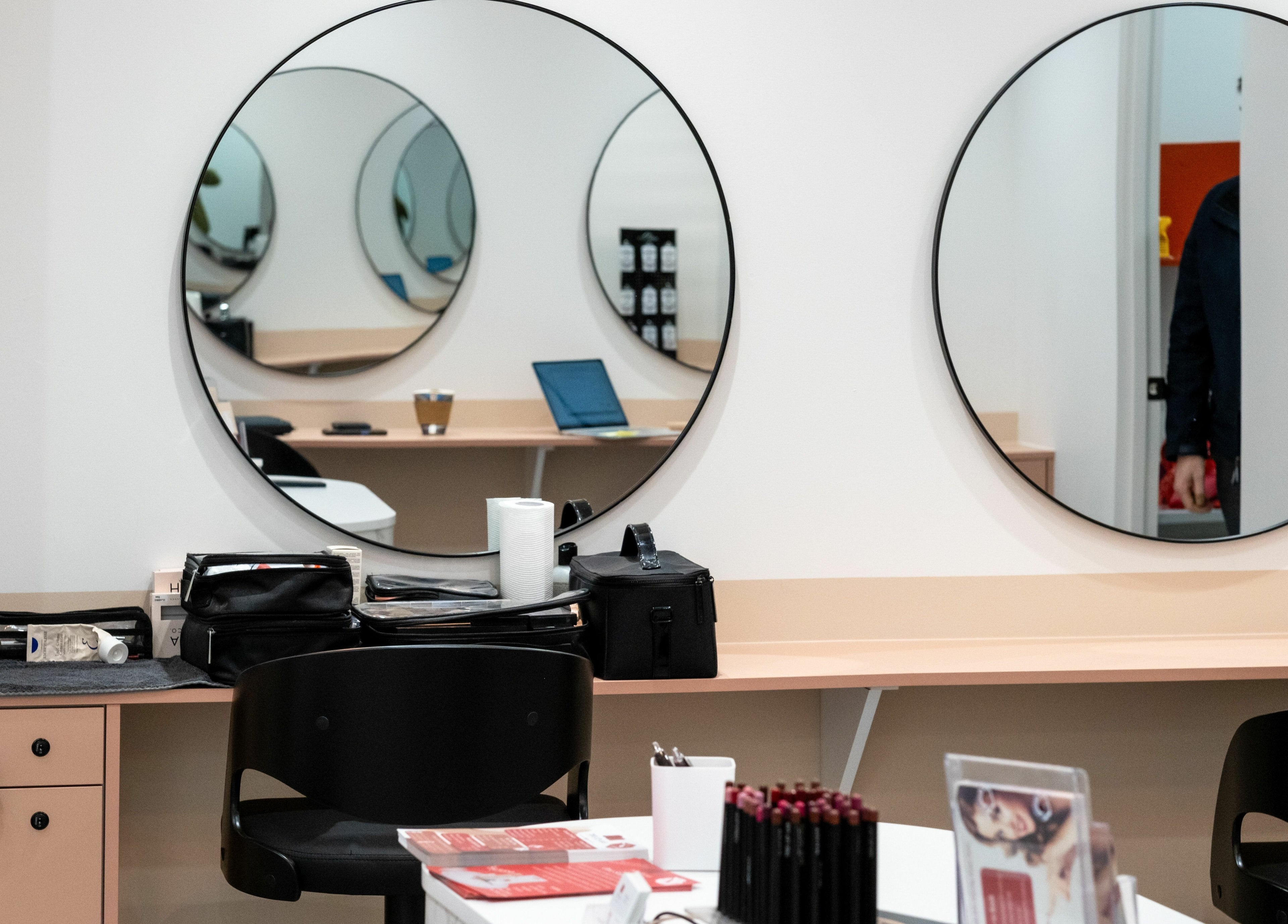 Chic makeup station with round mirrors at The Lip Lab, Perth, Western Australia, AU.