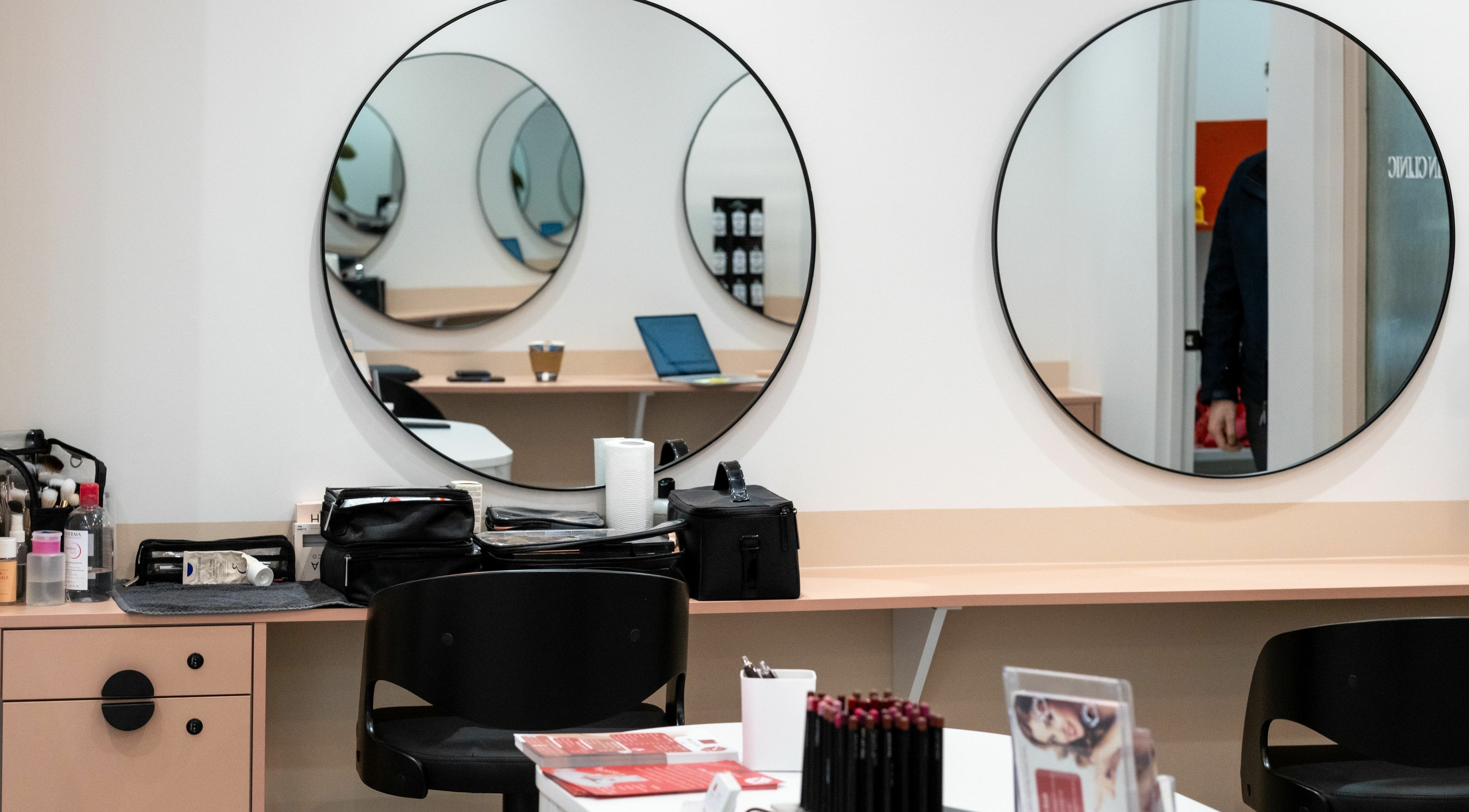 Chic makeup station with round mirrors at The Lip Lab, Perth, Western Australia, AU.