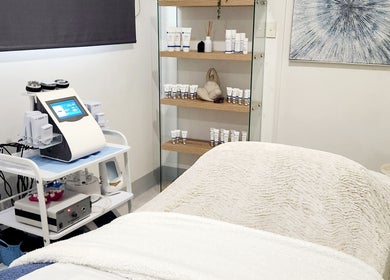 Treatment room at Youthful Glow Skin and Body Clinic, Mountain Creek, Queensland, AU with modern skincare equipment.