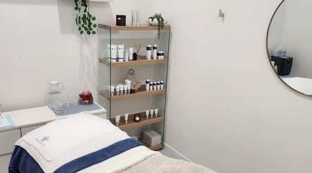 Calm treatment room at Youthful Glow Skin & Body Clinic, Mountain Creek, Queensland, AU with beauty products.