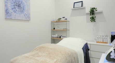 Cozy treatment room at Youthful Glow Skin & Body Clinic, Mountain Creek, Queensland, AU, with skincare products.