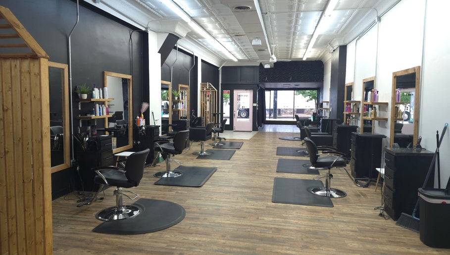 Modern salon chairs in Beauty Revival, Ashland, Ohio, US, showcasing elegant styling stations.