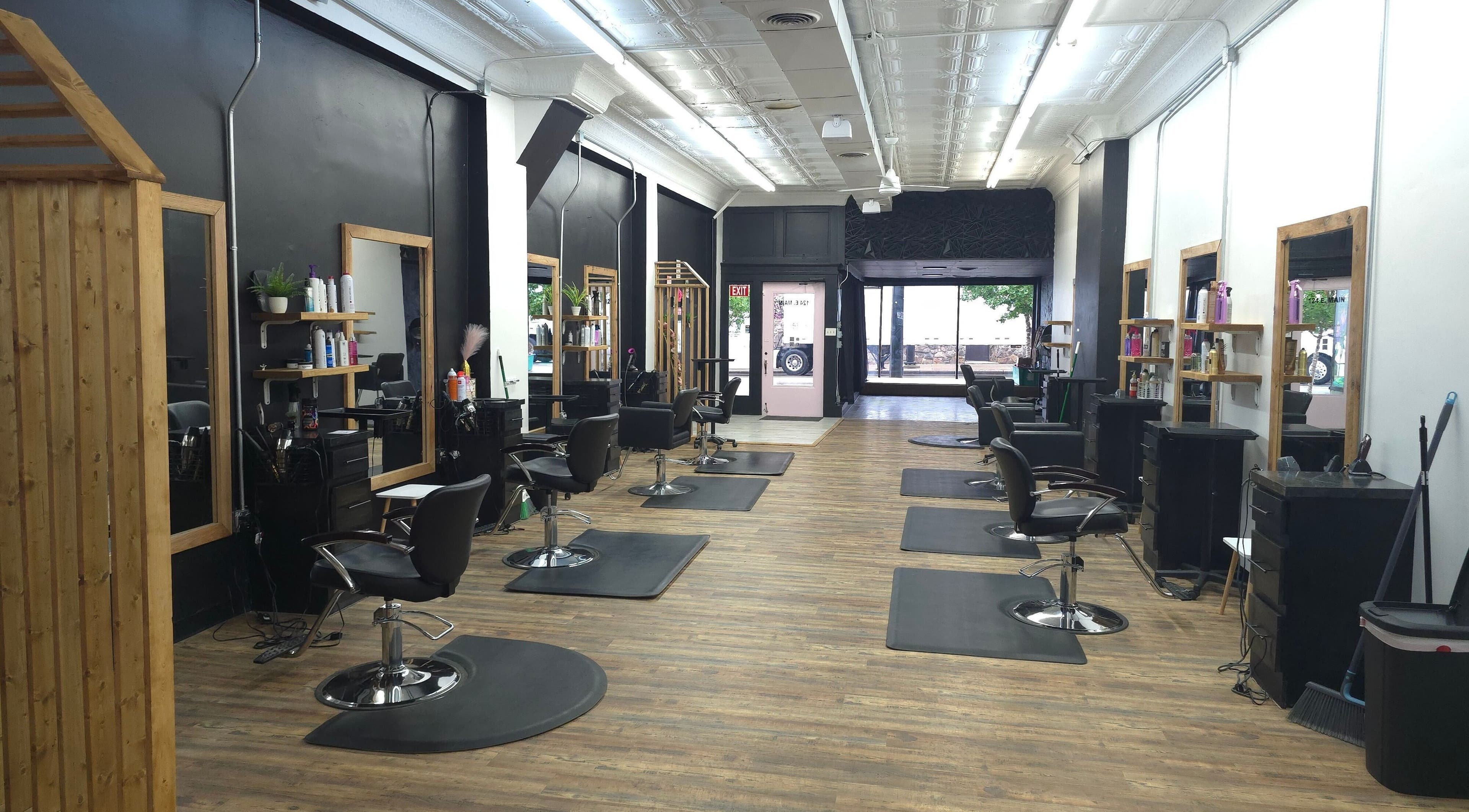 Modern salon chairs in Beauty Revival, Ashland, Ohio, US, showcasing elegant styling stations.