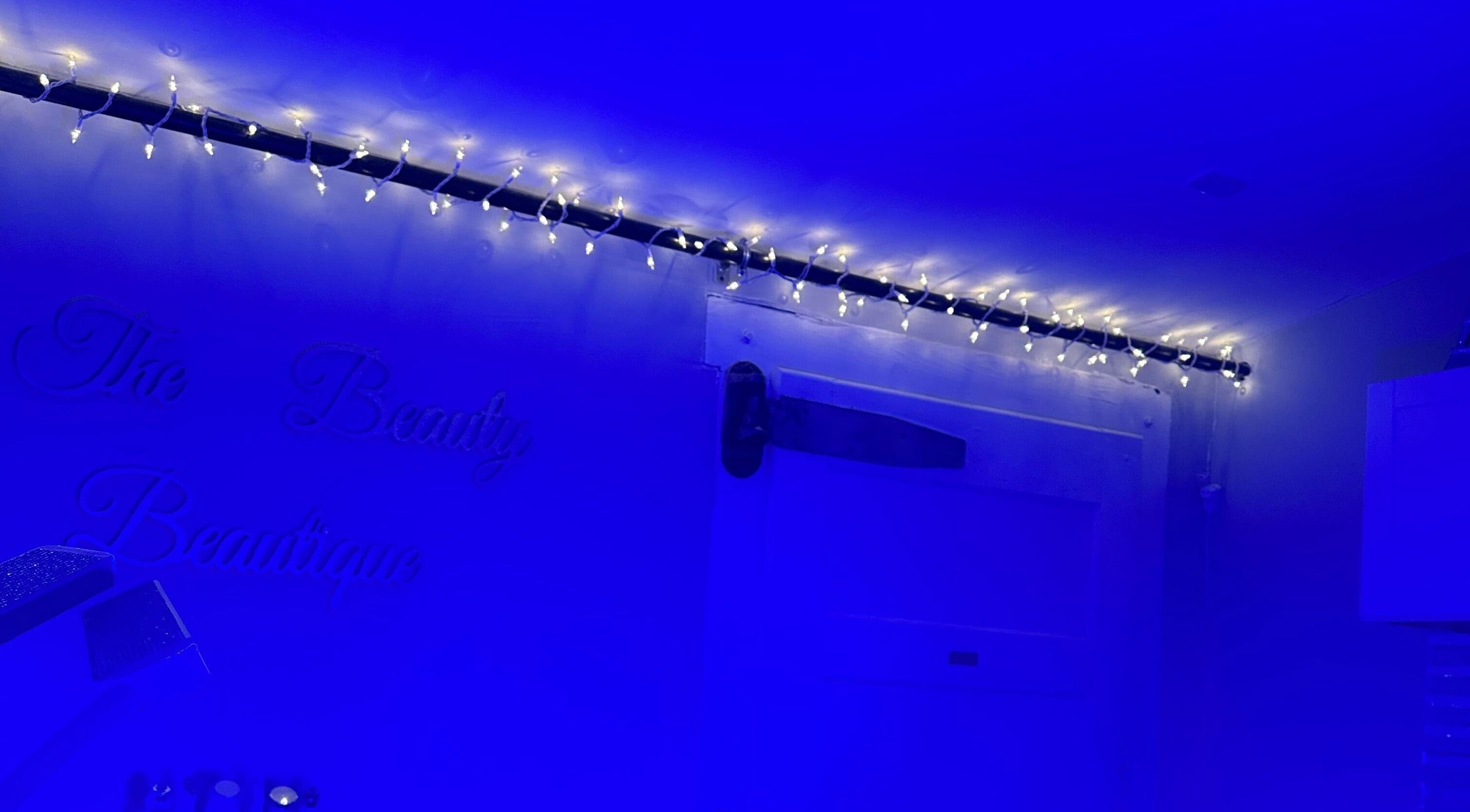 The Beauty Beautique's tranquil blue room with twinkling fairy lights, Wilmington, Massachusetts, US.
