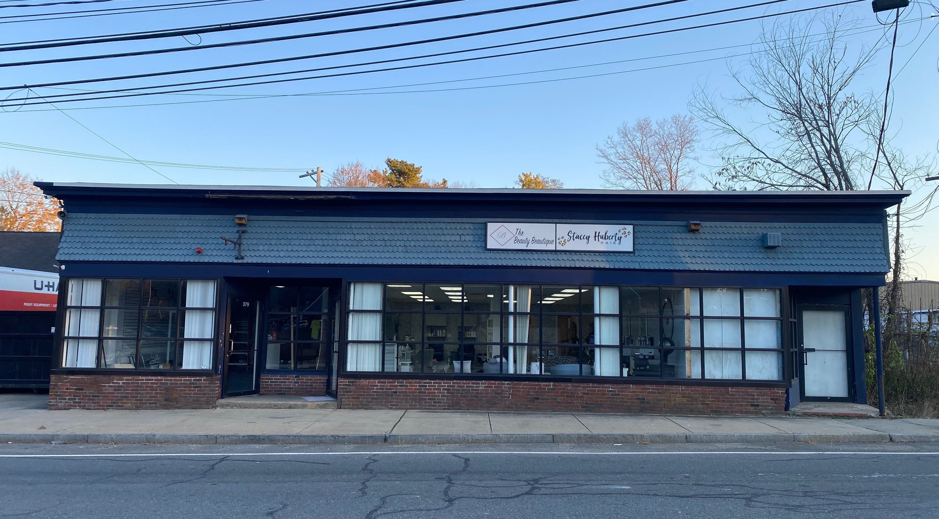 Front view of The Beauty Beautique, Wilmington, Massachusetts, US, showcasing its modern exterior design.