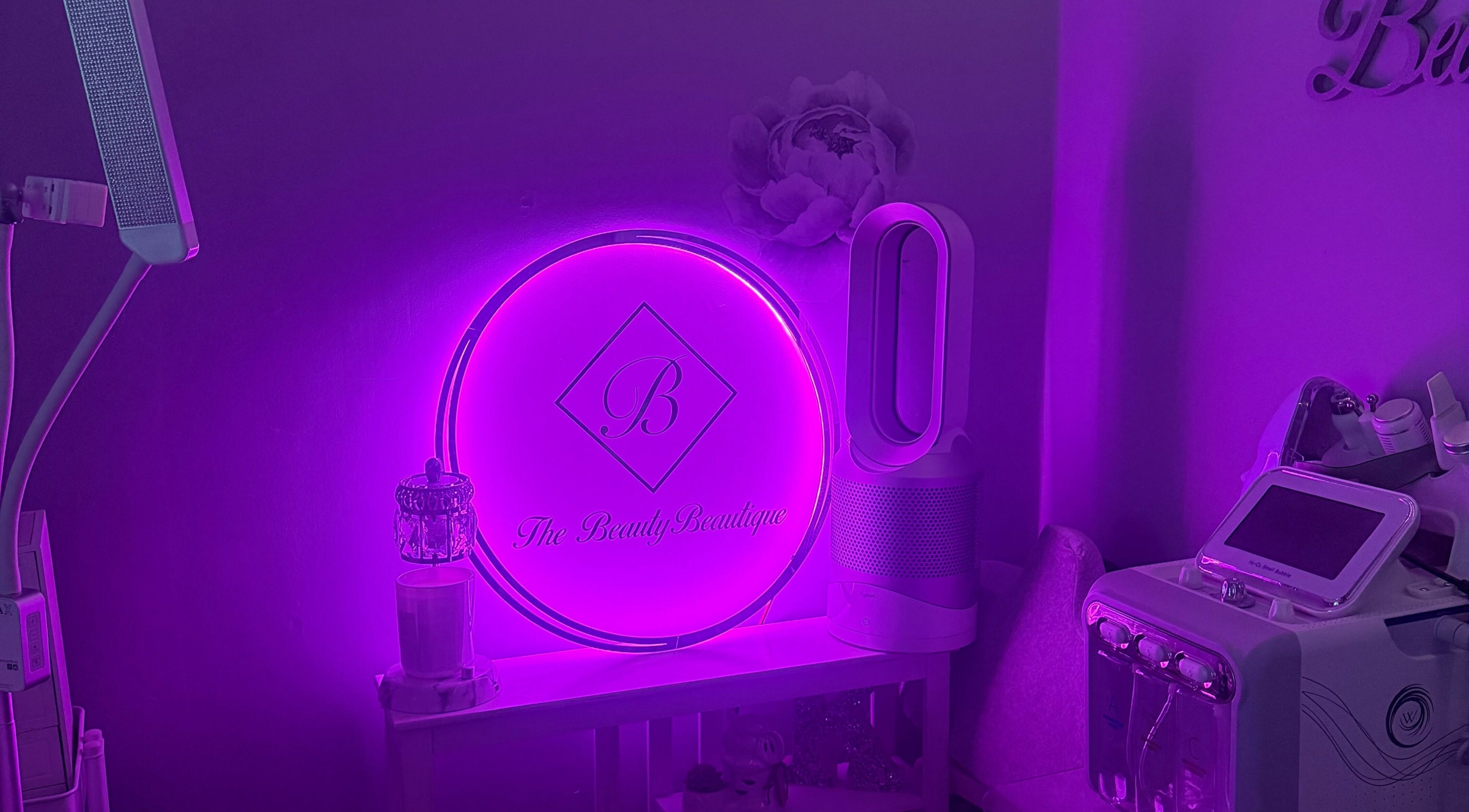 Neon sign at The Beauty Beautique in Wilmington, Massachusetts, US, creating a modern, inviting ambiance.