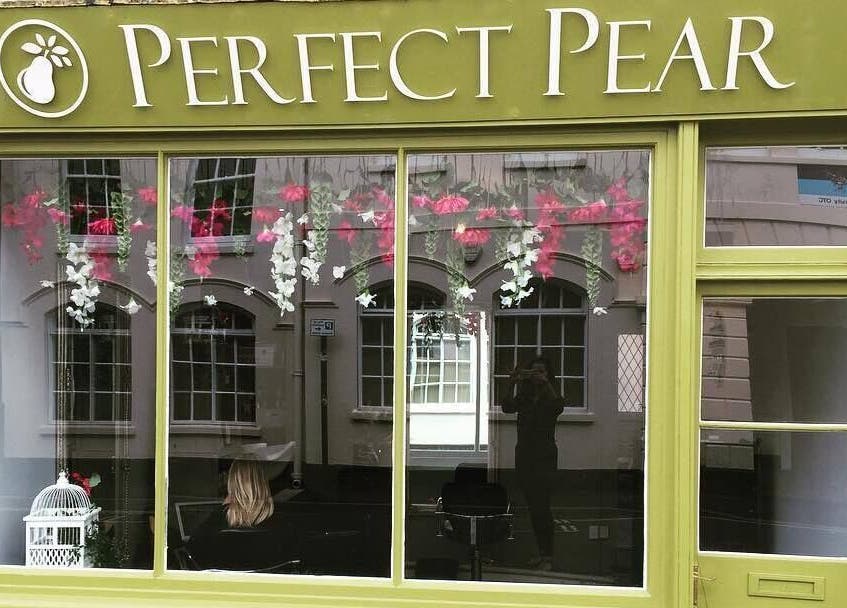Front of Perfect Pear - Brazilian Waxing Technique Specialist in Southampton, England, GB with greenery and flowers.