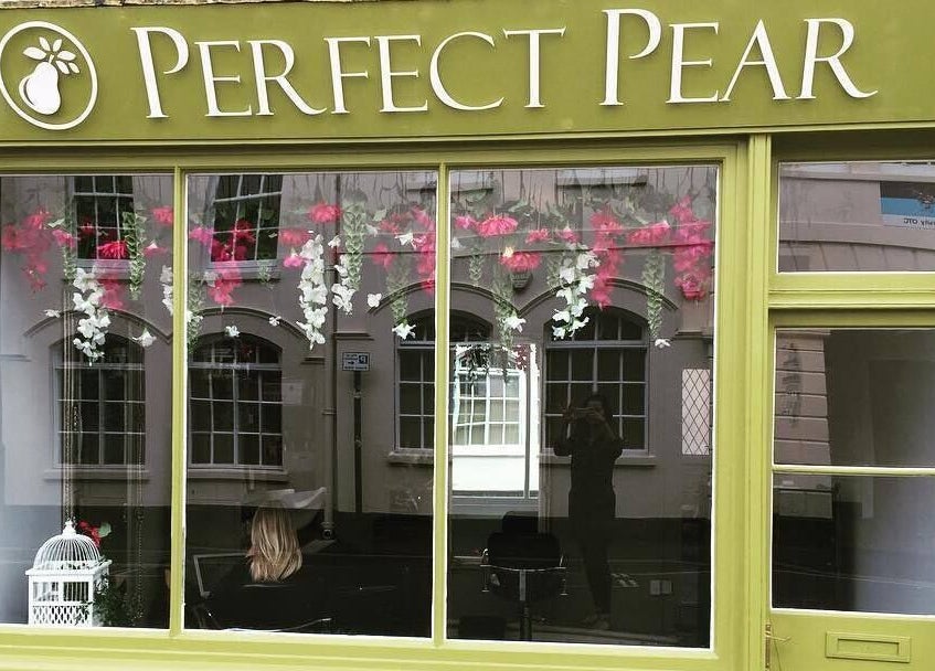 Front of Perfect Pear - Brazilian Waxing Technique Specialist in Southampton, England, GB with greenery and flowers.