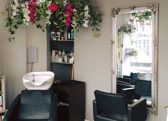 Chic beauty salon at Perfect Pear, Southampton, England, GB, featuring elegant floral decor and professional setup.