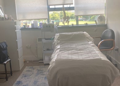 Cozy treatment room at JKA Glamour Beauty, Bray, County Wicklow, IE with massage bed and relaxing ambiance.
