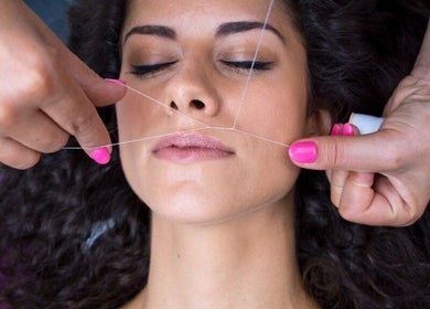 Facial threading at Skin clinic by Glamour Beauty, Bray, County Wicklow, IE, ensuring precise brow shaping.