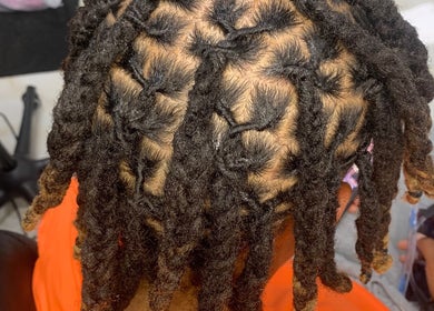 Intricate twist hairstyle at Glamazon Salon, Nassau, New Providence, BS. Perfect for unique style seekers.