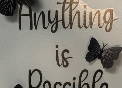 Motivational wall art with butterflies at Glamazon Salon, Nassau, New Providence, BS.